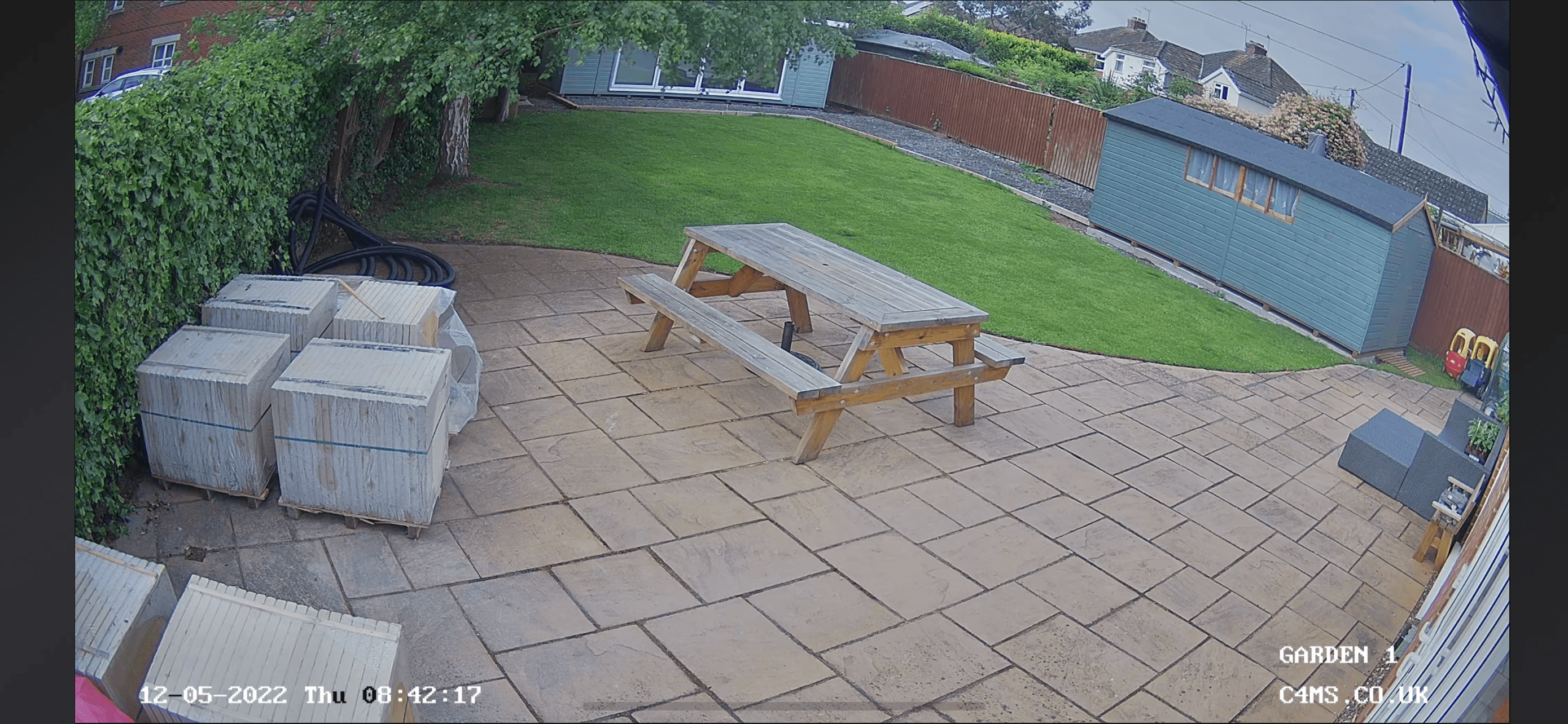 CCTV security camera picture shows a daylight scene